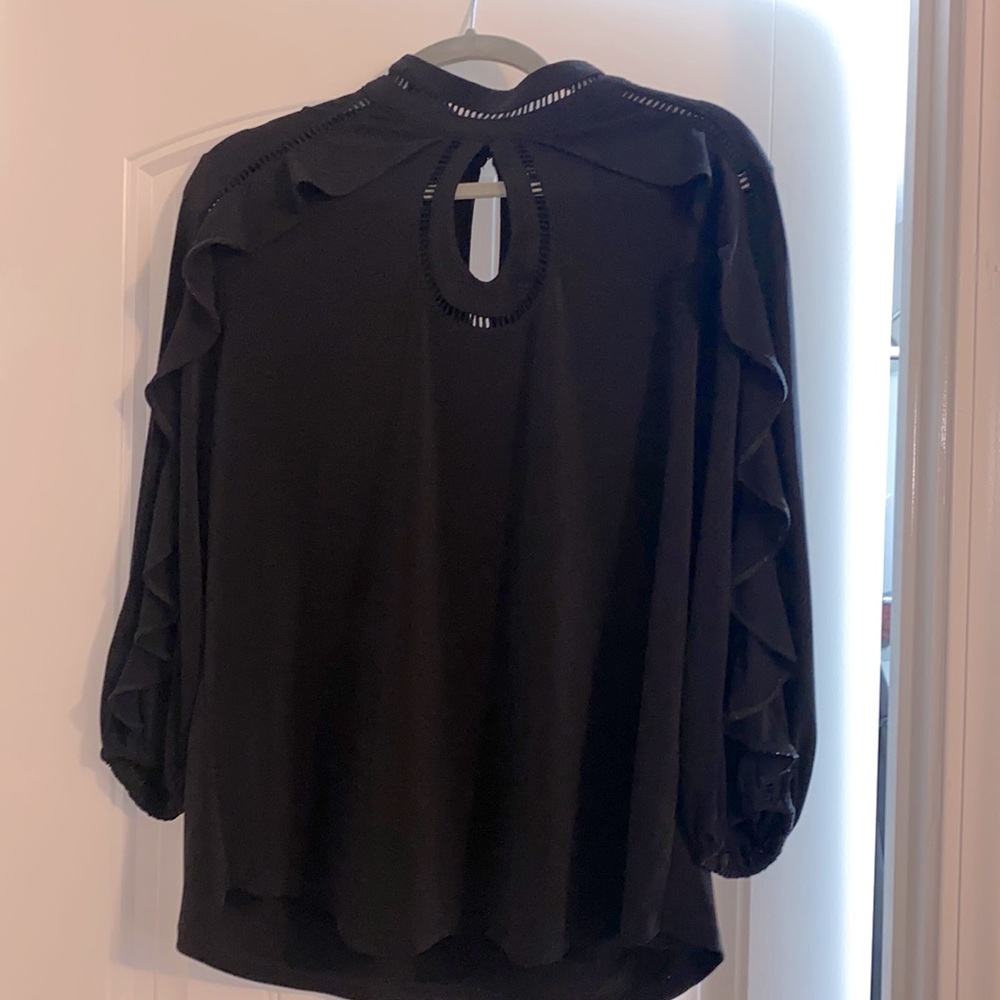 Black blouse w/ ruffles & beautiful cut out design